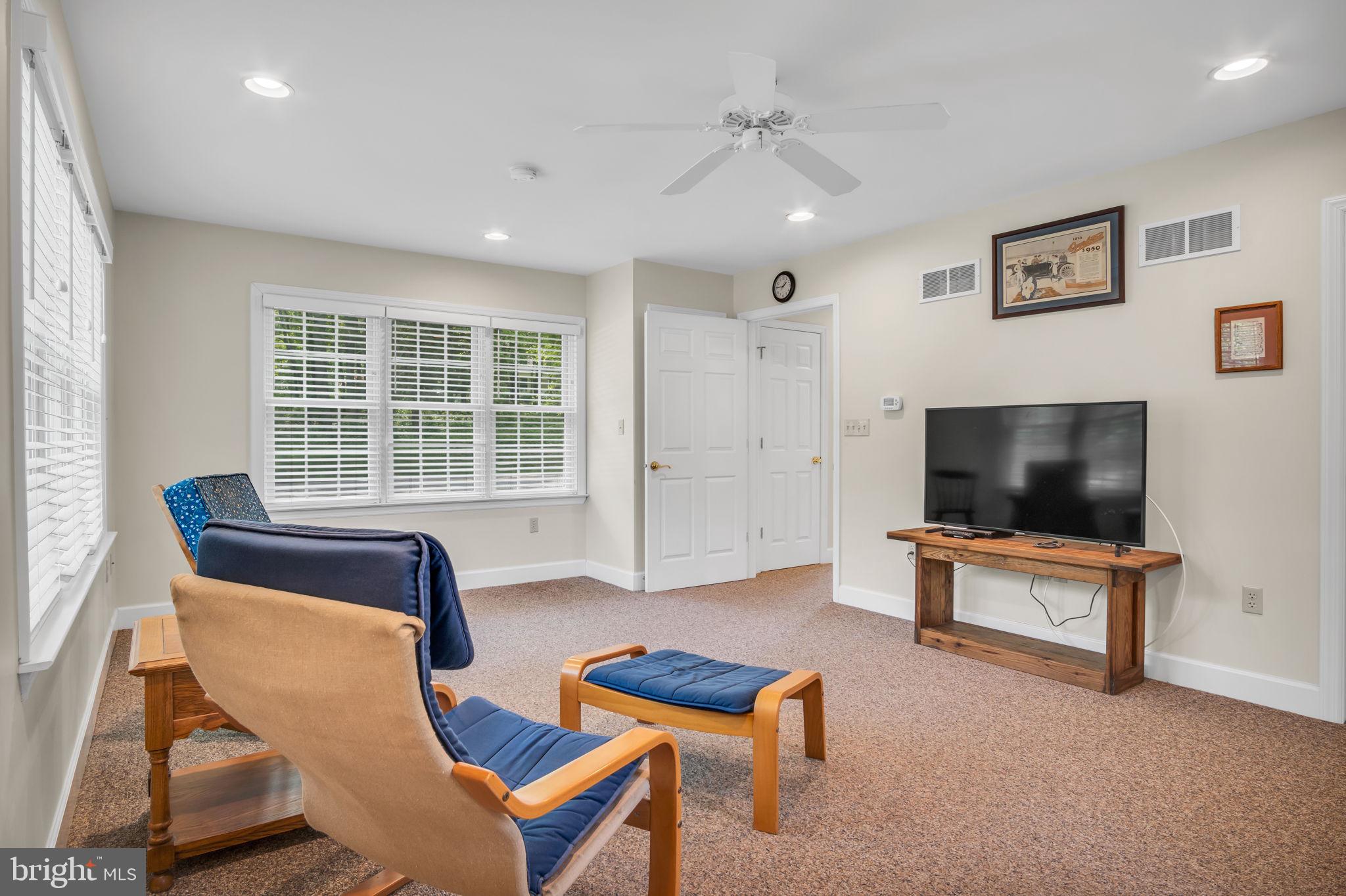 1037 Siddonsburg Road Lewisberry, PA 17339 - Photo 17 of 61 a living room with furniture and a flat screen tv