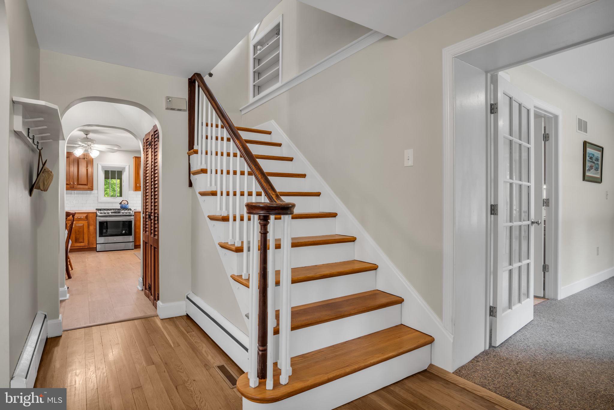 1037 Siddonsburg Road Lewisberry, PA 17339 - Photo 20 of 61 a view of a hallway with entryway wooden floor and stairs