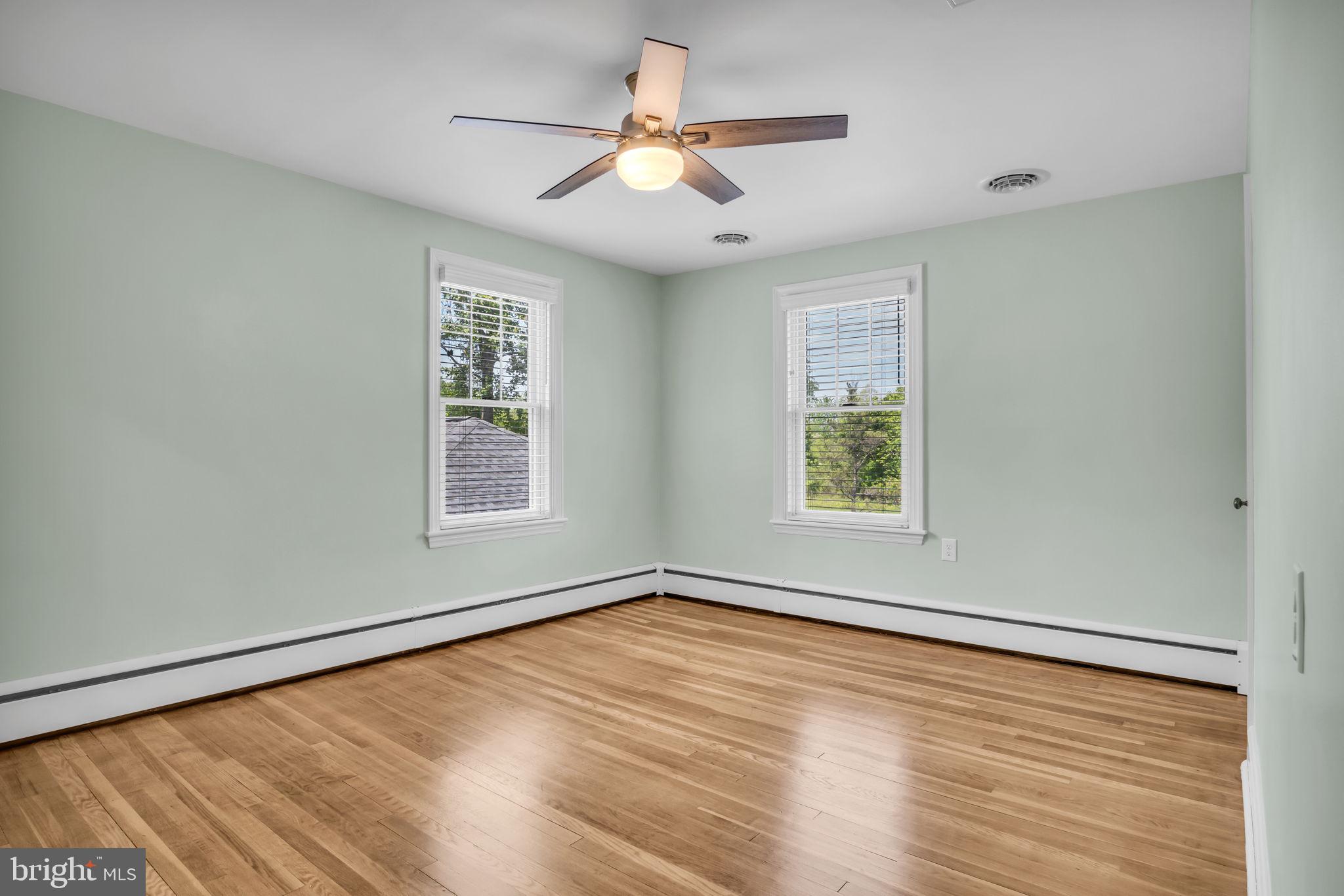 1037 Siddonsburg Road Lewisberry, PA 17339 - Photo 25 of 61 a view of an empty room with wooden floor and a window