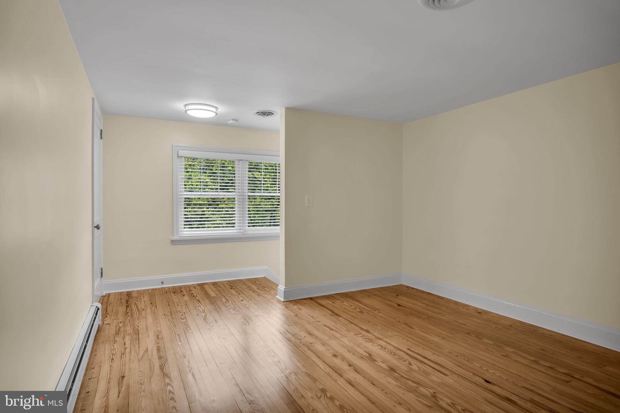 1037 Siddonsburg Road Lewisberry, PA 17339 - Photo 30 of 61 wooden floor in an empty room with a window