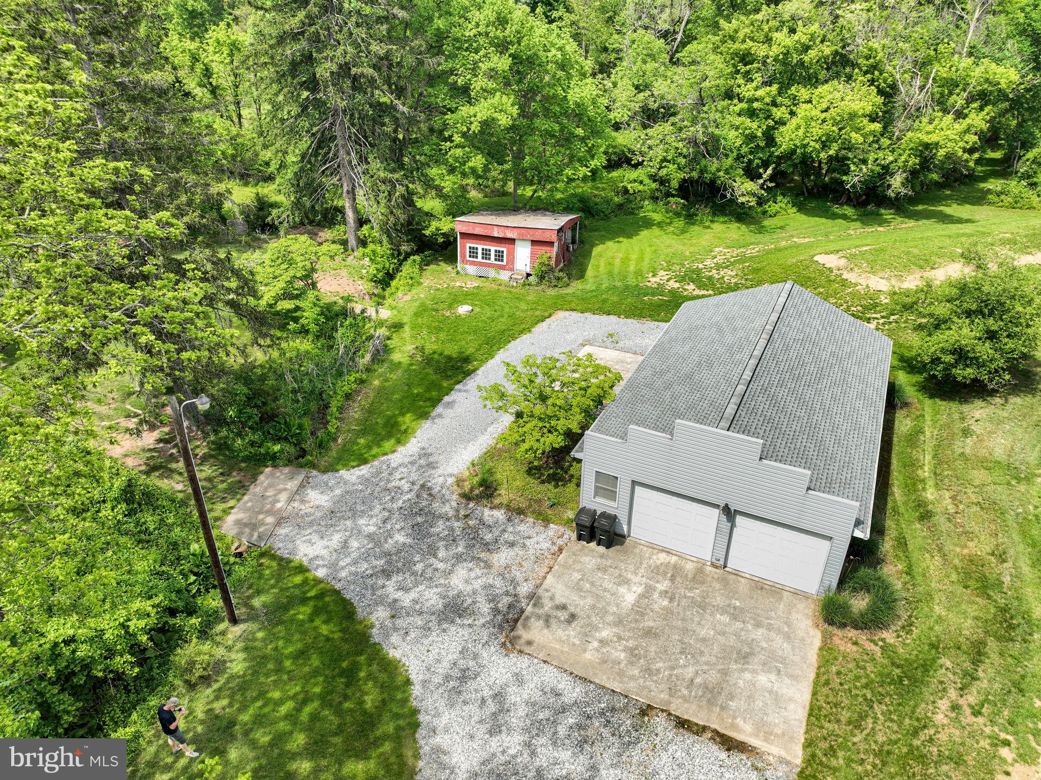 1037 Siddonsburg Road Lewisberry, PA 17339 - Photo 36 of 61 a view of a garden with an outdoor seating