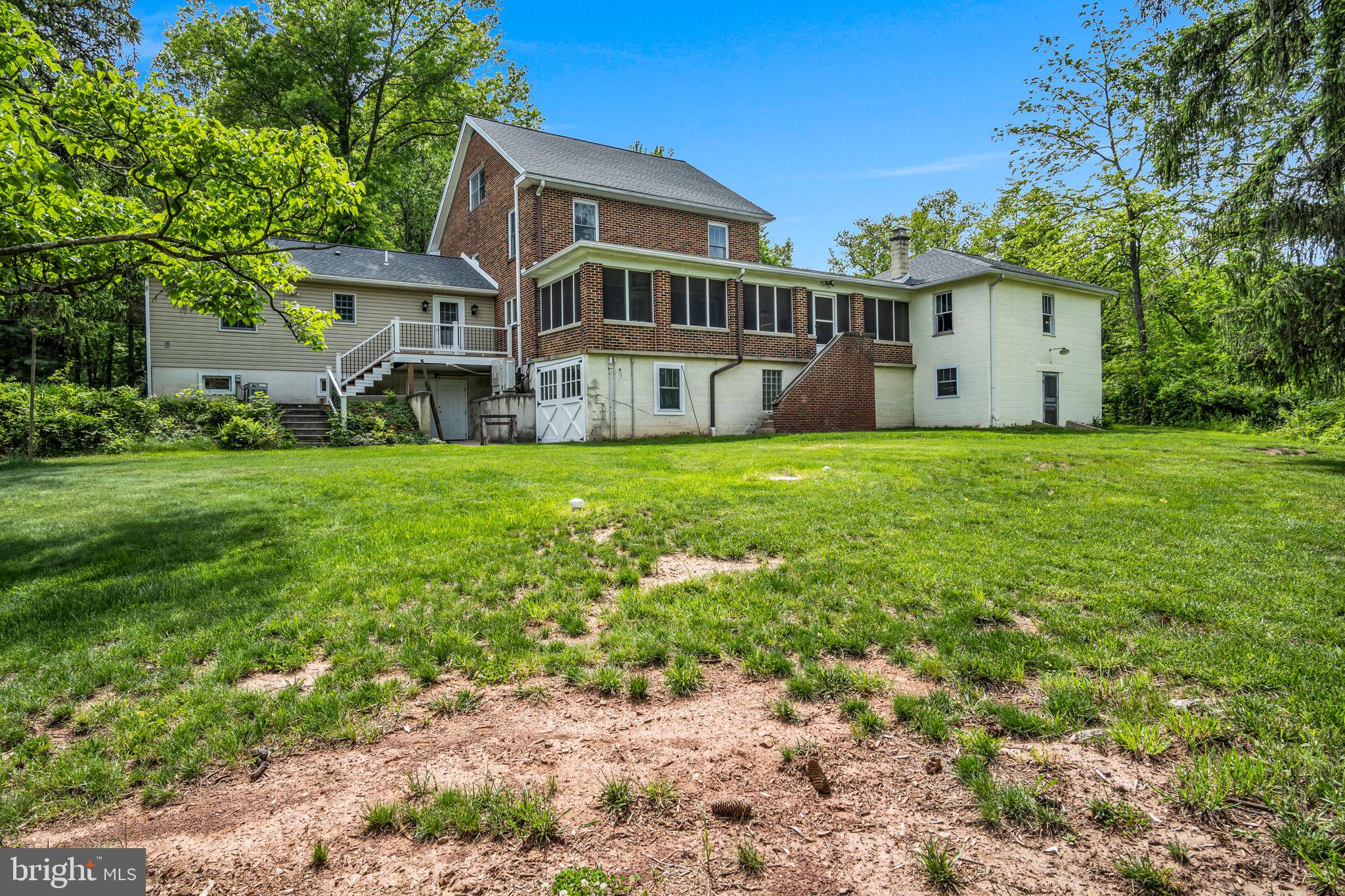 1037 Siddonsburg Road Lewisberry, PA 17339 - Photo 43 of 61 a front view of a house with a garden