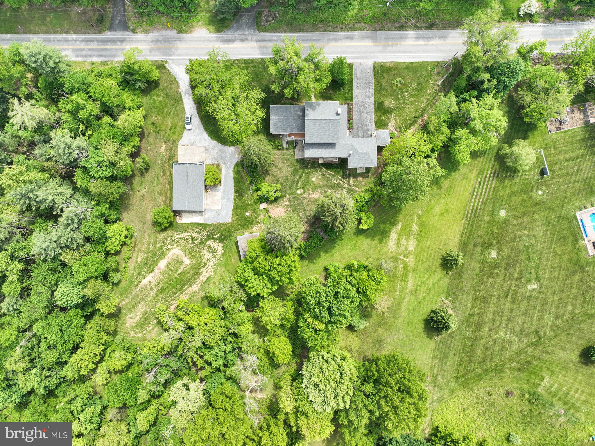 1037 Siddonsburg Road Lewisberry, PA 17339 - Photo 50 of 61 a view of a house with a yard