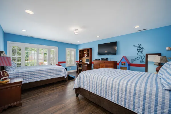 a room with gym equipment and a table