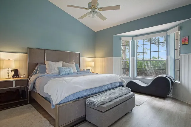 a bed room with a bed and a couch