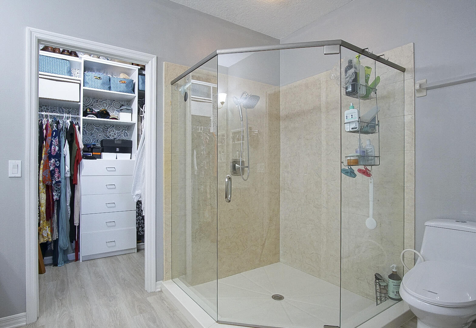 1581 Southwest Harbour Isles Circle, Unit 58 Port St. Lucie, FL 34986 - Photo 13 of 38 a bathroom that has a glass shower door