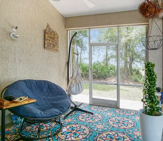 a living room with a couch and a table