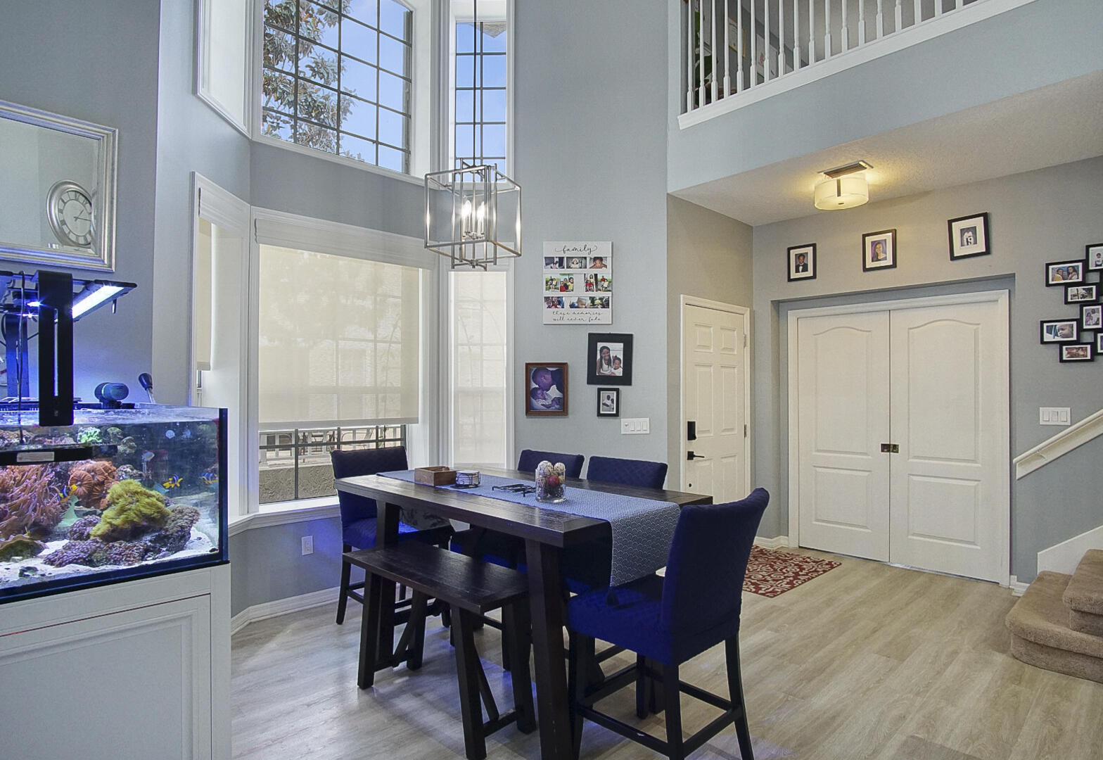 1581 Southwest Harbour Isles Circle, Unit 58 Port St. Lucie, FL 34986 - Photo 5 of 38 a view of a dining room with furniture and chandelier