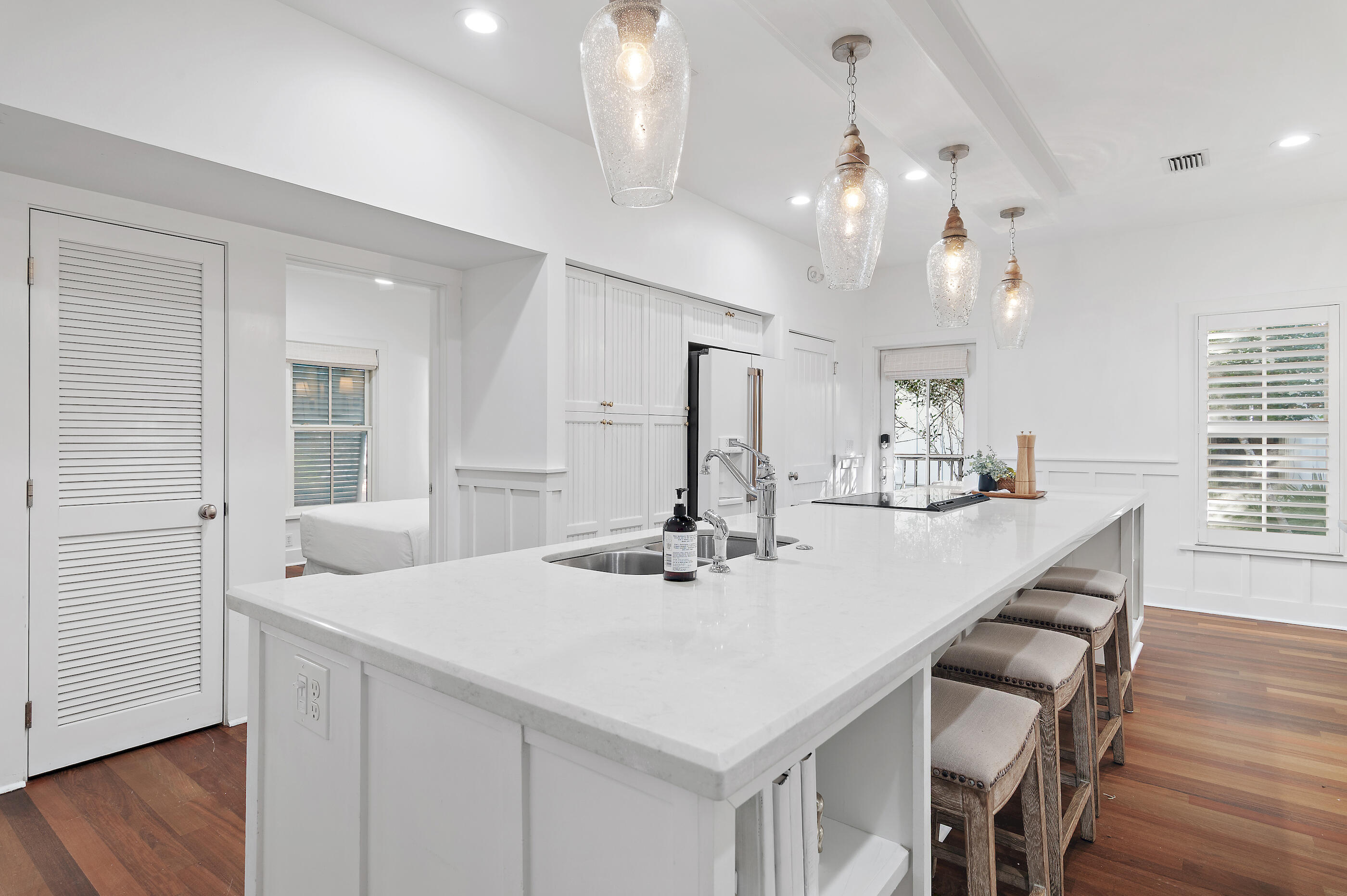 18 Olivia Lane Inlet Beach, FL 32461 - Photo 14 of 44 a kitchen with stainless steel appliances kitchen island a island a stove a table and chairs in it