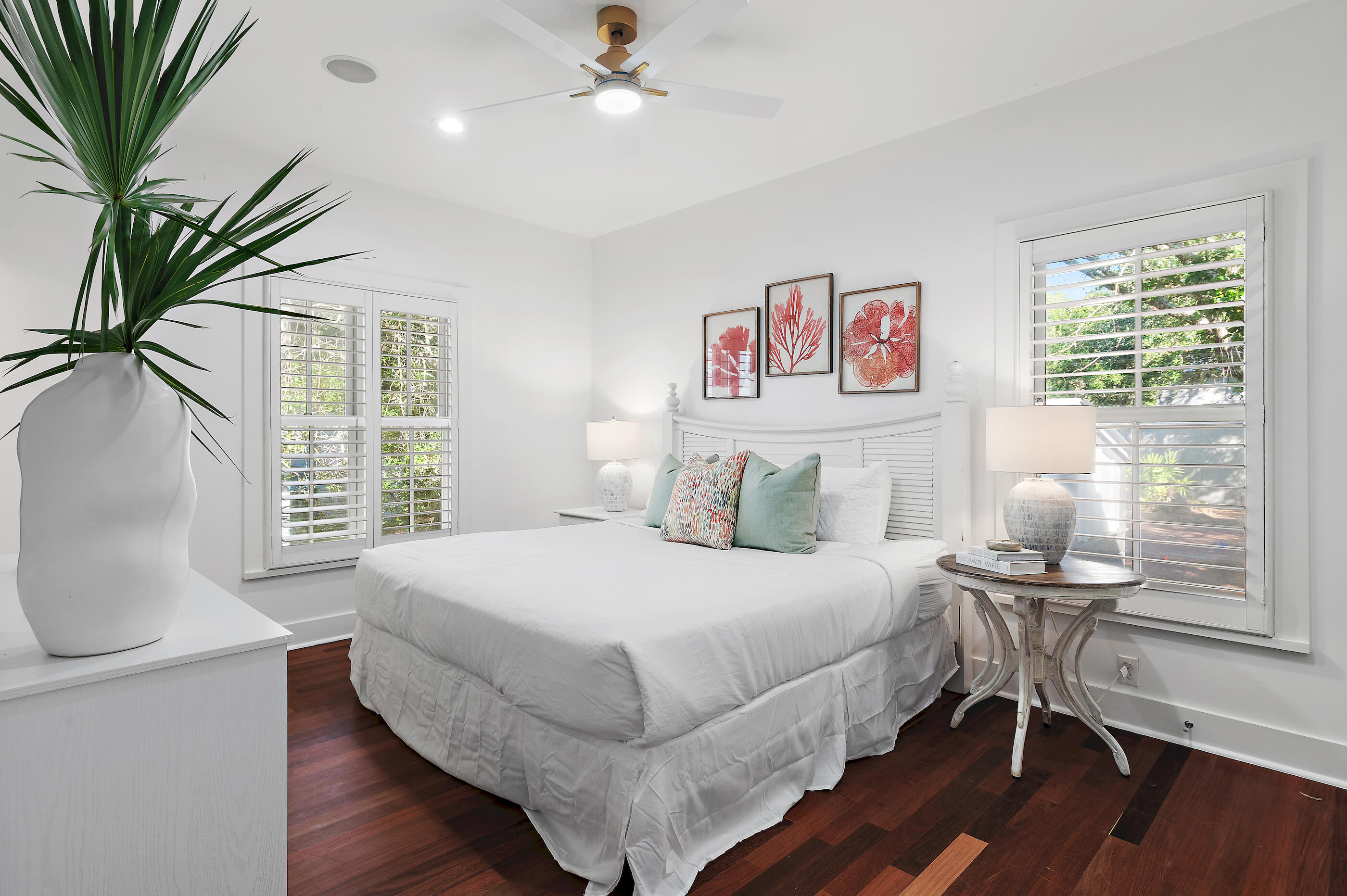 18 Olivia Lane Inlet Beach, FL 32461 - Photo 21 of 44 a bedroom with a large bed a chandelier and a window