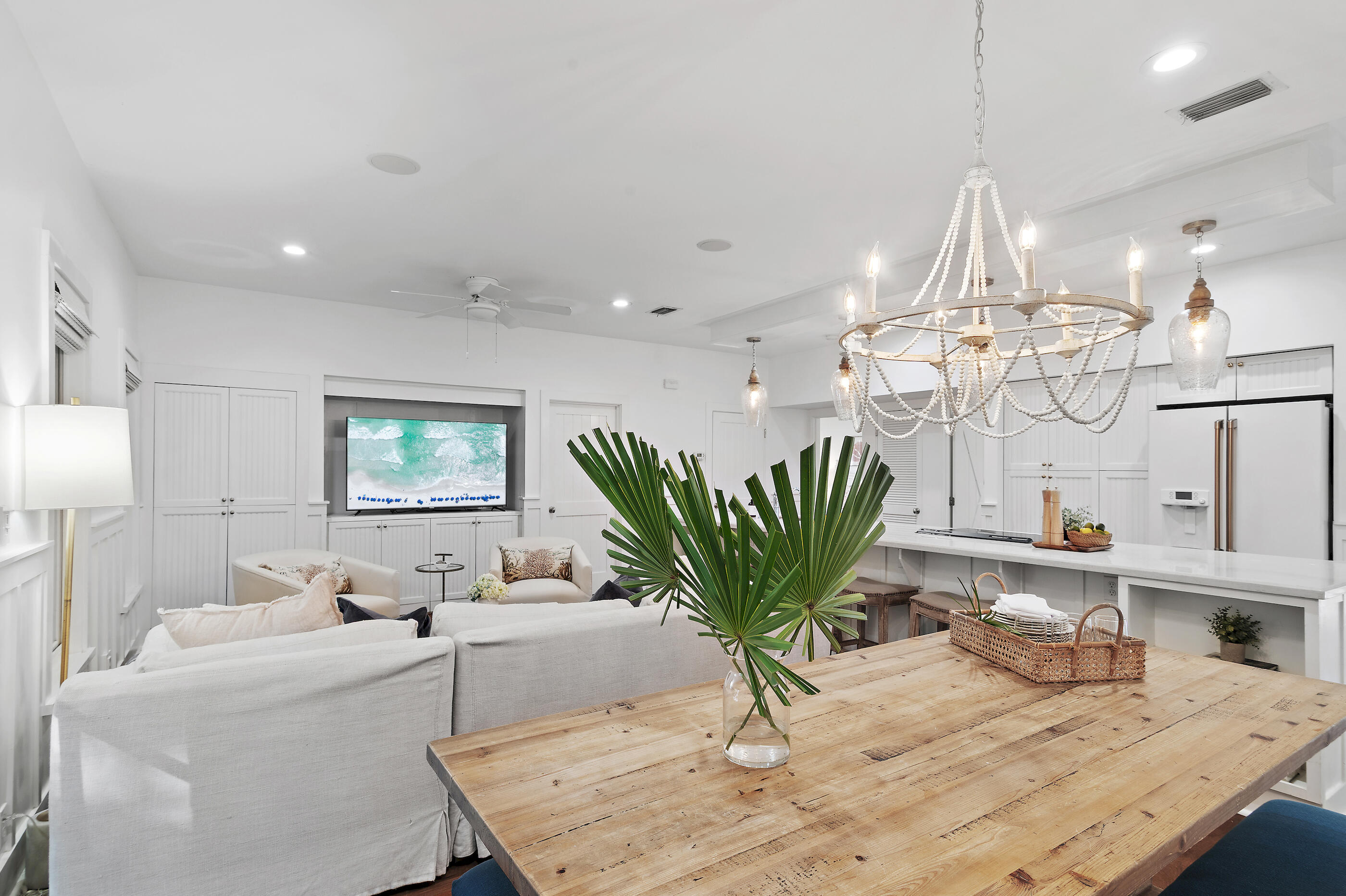 18 Olivia Lane Inlet Beach, FL 32461 - Photo 6 of 44 a living room with furniture a chandelier and a dining table