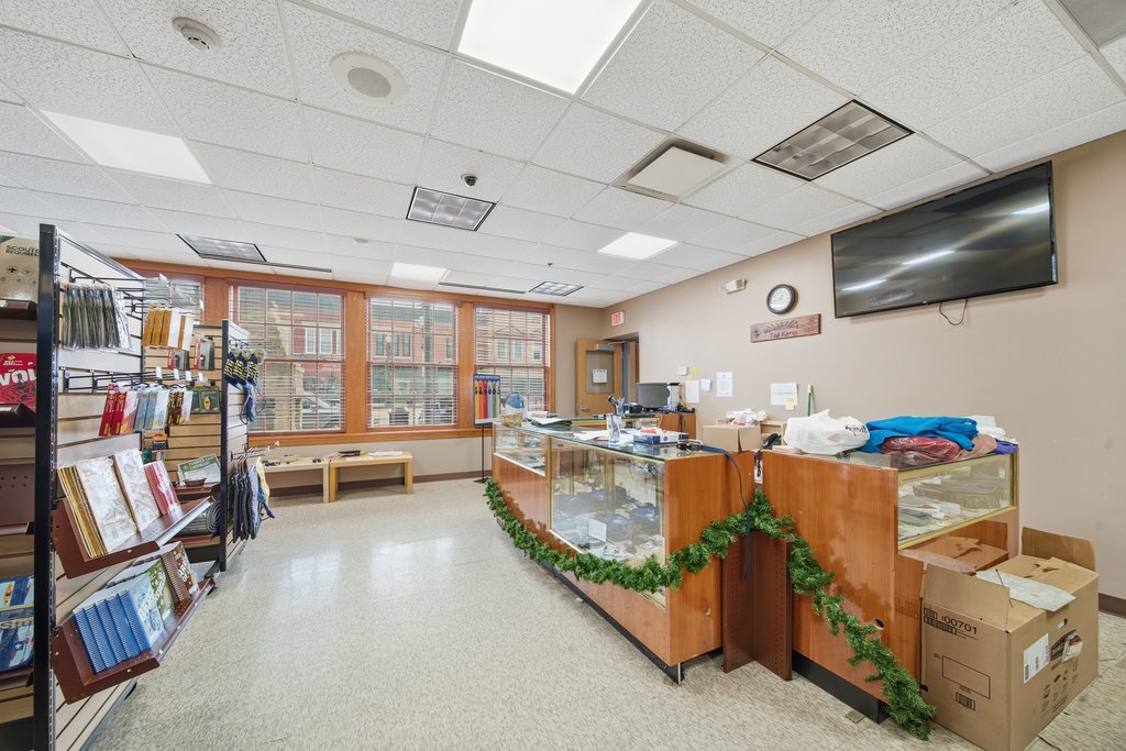 921 South State Street Lockport, IL 60441 - Photo 11 of 28 a living room with furniture and a flat screen tv