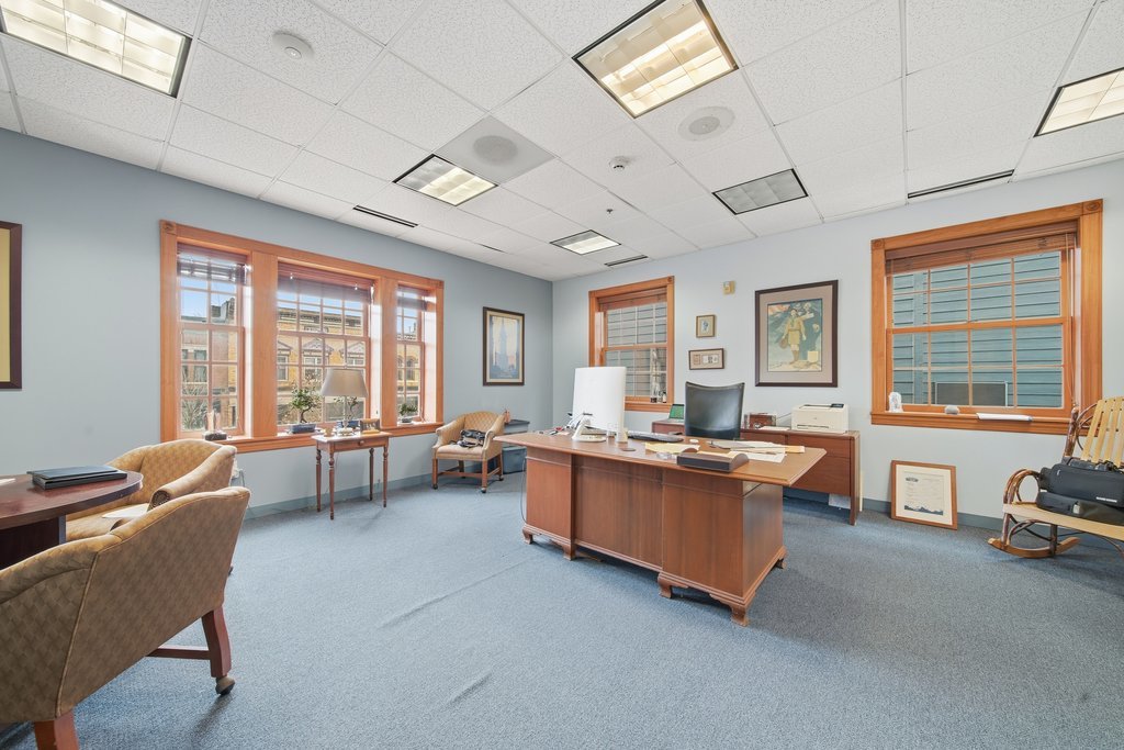 921 South State Street Lockport, IL 60441 - Photo 19 of 28 a living room with furniture and a large window