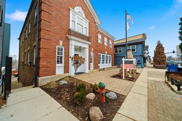 a view of a lobby with a patio and fire pit