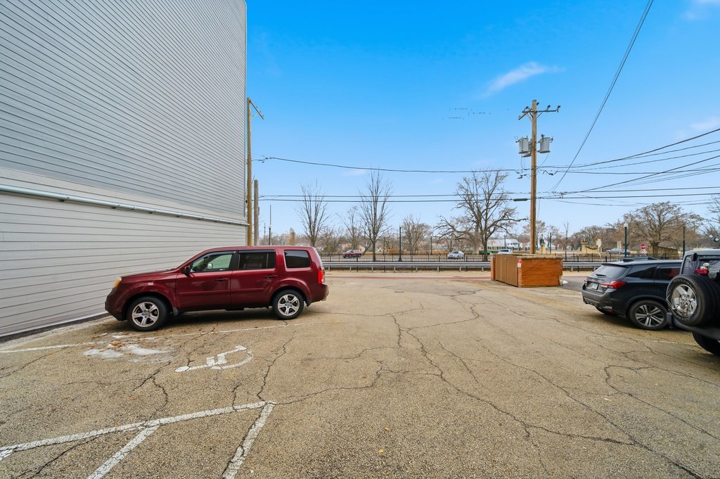921 South State Street Lockport, IL 60441 - Photo 6 of 28 a view of a cars is parked in front of a house