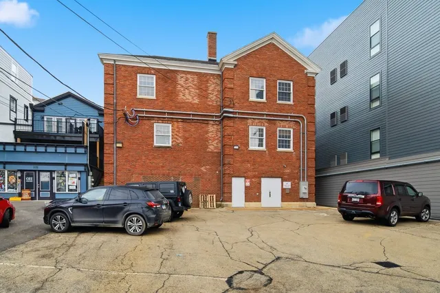 a view of a hallway with staircase