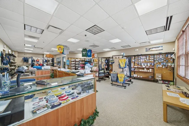 a view of a room with stairs and furniture