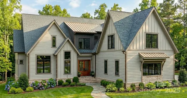 a view of a house with garden and plants