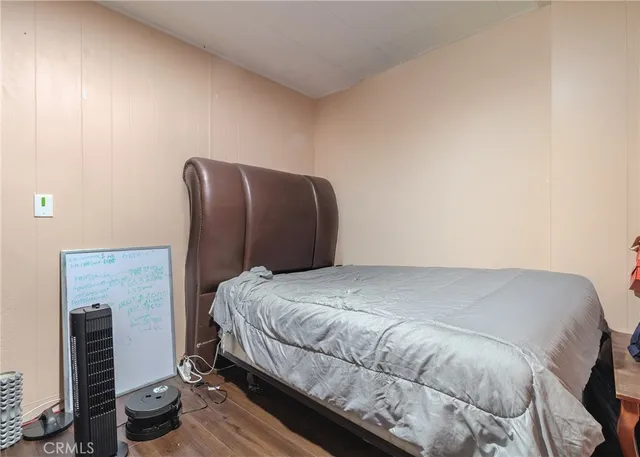 a view of hallway with wooden floor