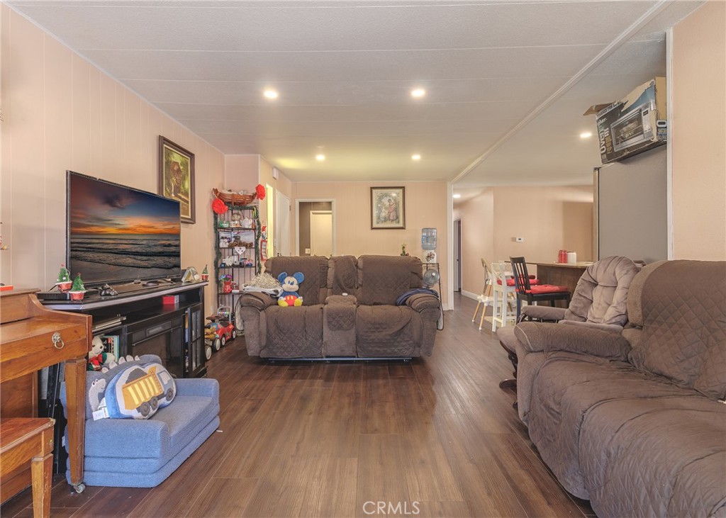1616 South Euclid Street Anaheim, CA 92804 - Photo 19 of 22 a living room with furniture and a flat screen tv