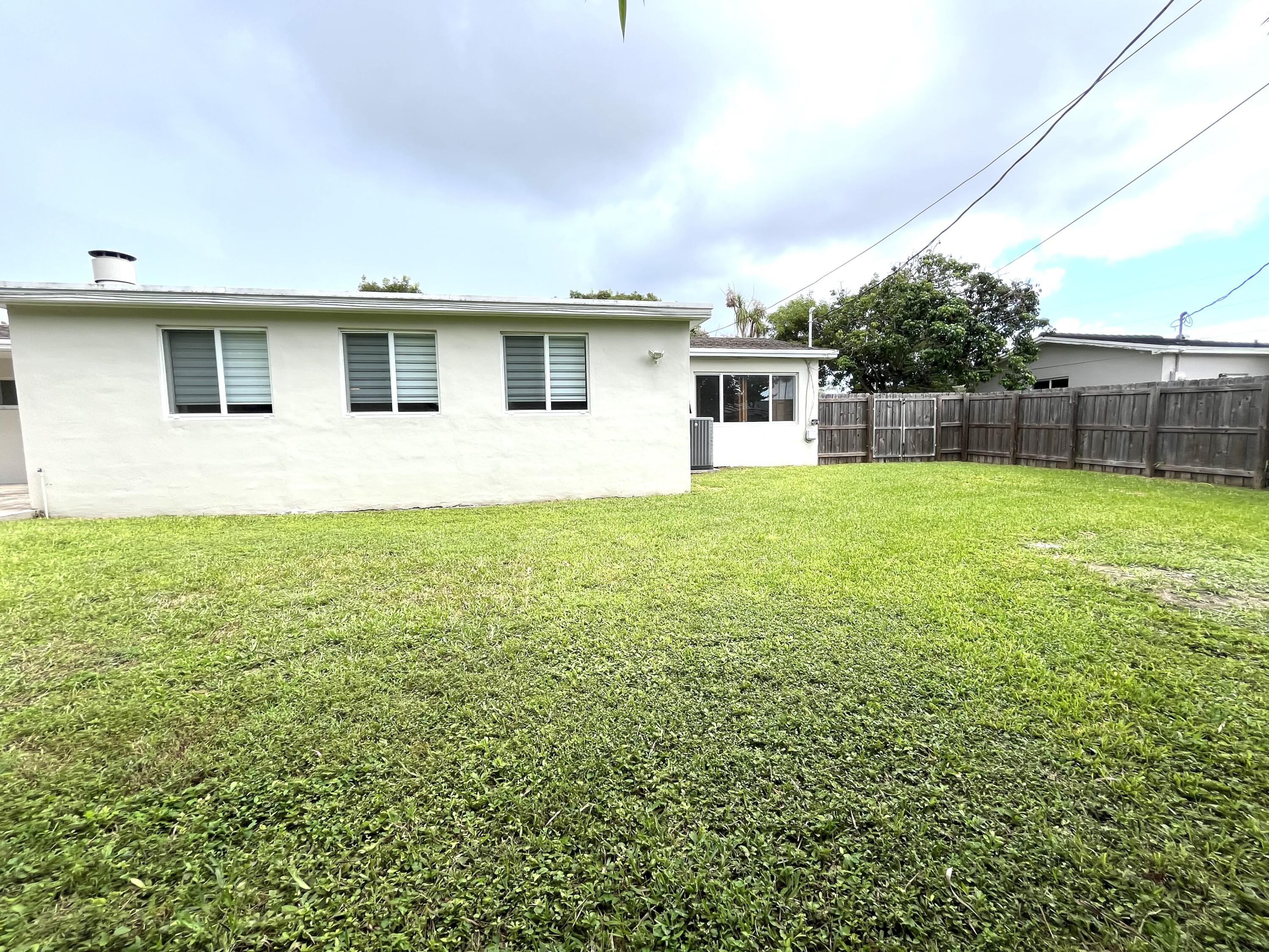 8760 Southwest 83rd Street Miami, FL 33173 - Photo 21 of 24 a house view with a outdoor space