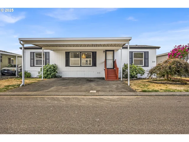 a view of a house with a garage