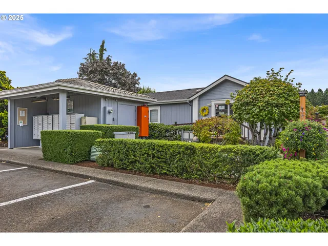 a picture of a wall with a white building