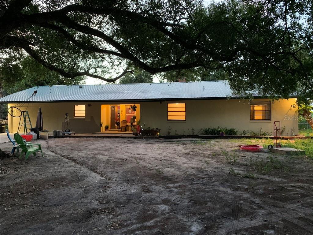a view of outdoor space and yard