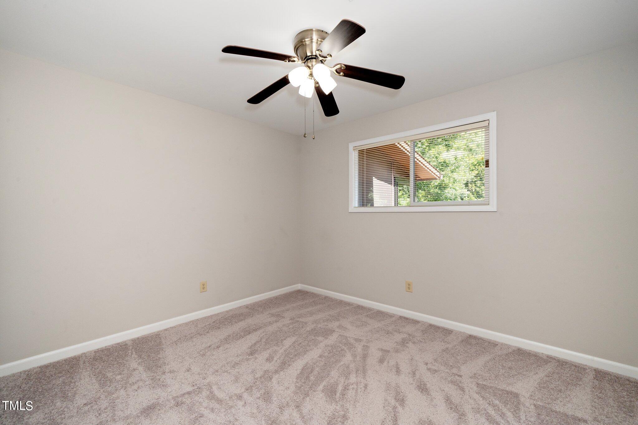 6406 Arnold Road Raleigh, NC 27607 - Photo 30 of 44 a view of room with ceiling fan
