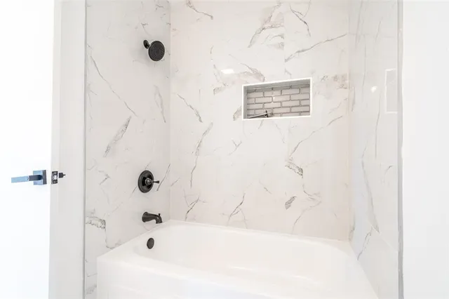 a bathroom with a bathtub