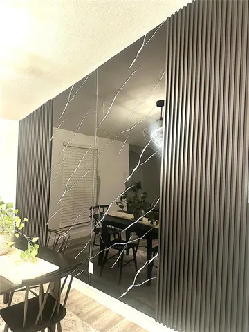 a view of a patio with wooden floor