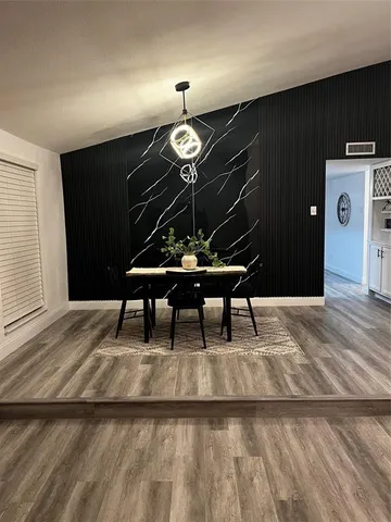 a view of a livingroom with furniture and window