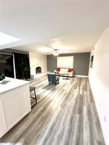 a view of kitchen with furniture and counter top space