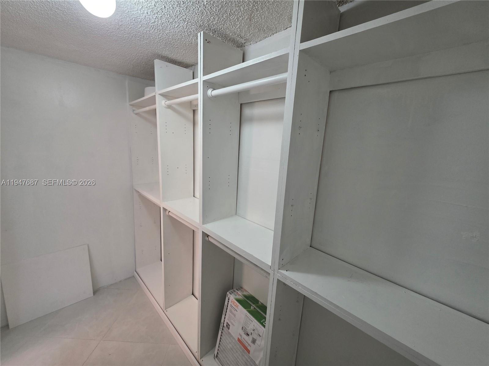 8307 Southwest 142nd Avenue, Unit E108 Miami, FL 33183 - Photo 13 of 22 a view of walk in closet