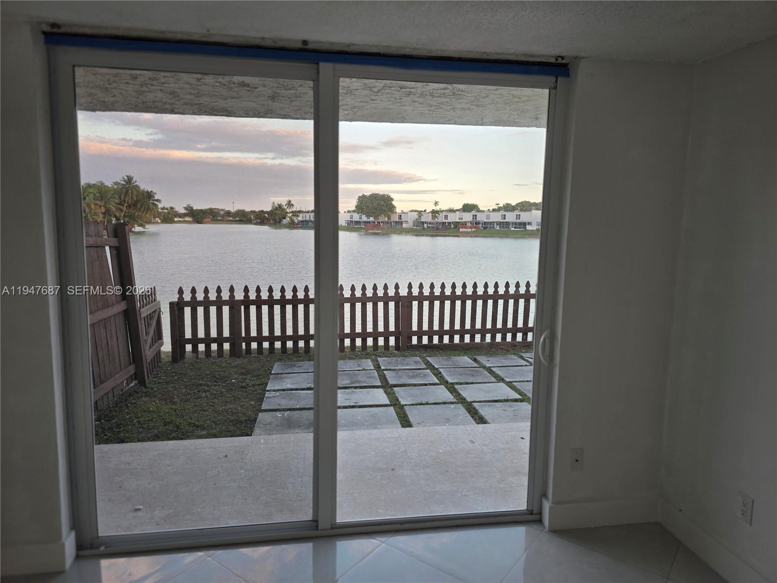 8307 Southwest 142nd Avenue, Unit E108 Miami, FL 33183 - Photo 8 of 22 a view of a wooden floor