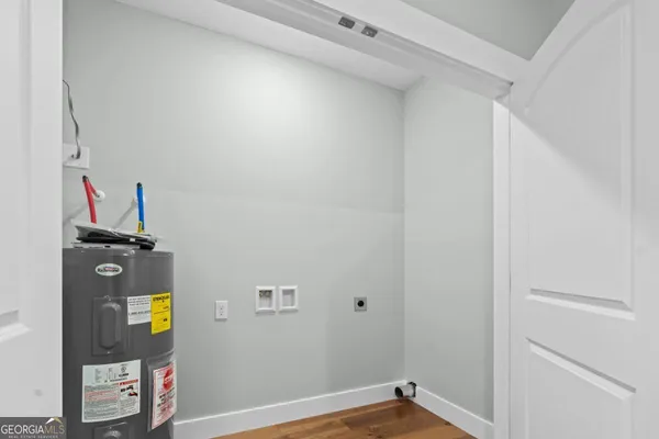 a view of an entryway with front door