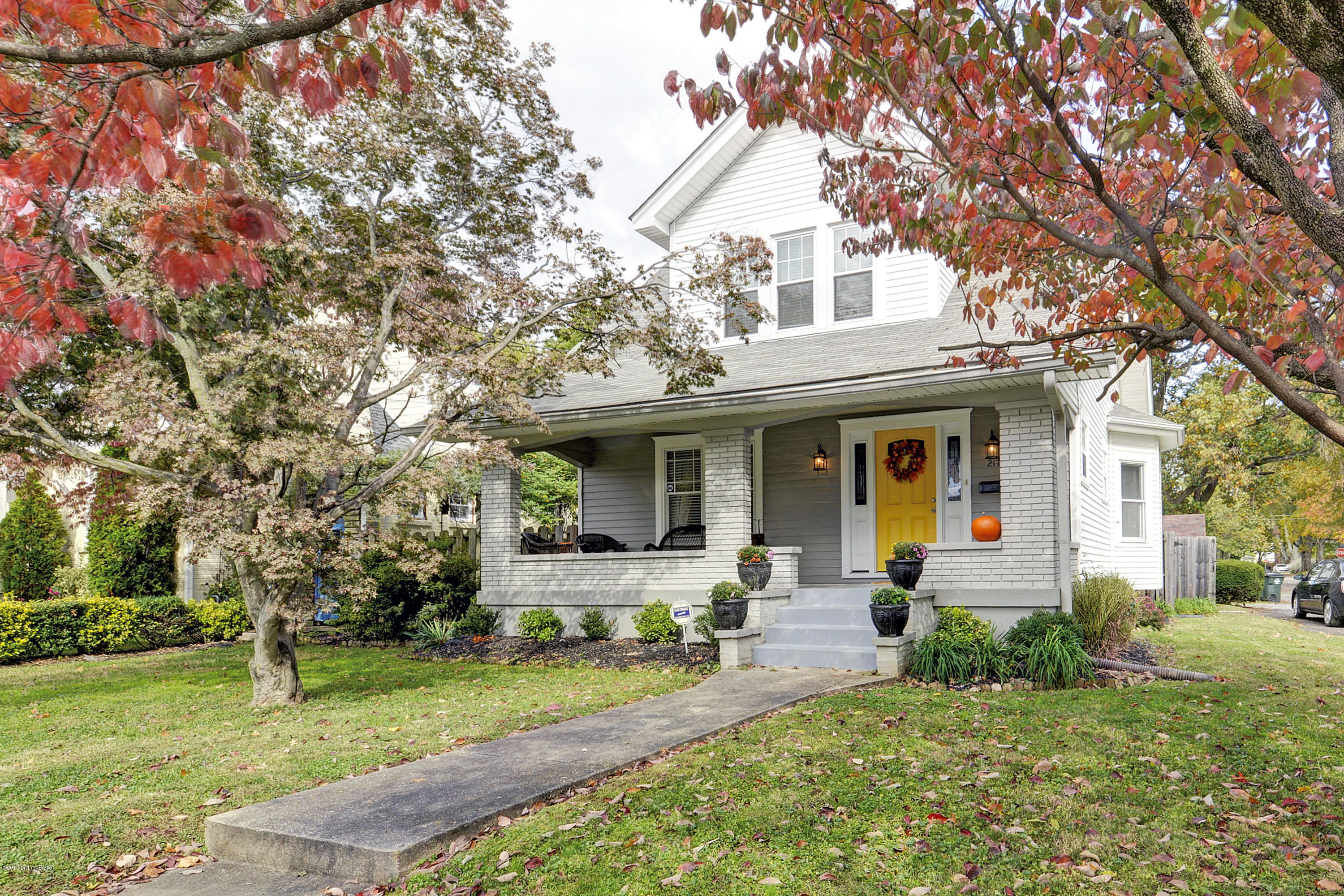 217 Iola Road Louisville, KY 40207 - Photo 2 of 44 The corner lot offers a large front yard and gorgeous approach.