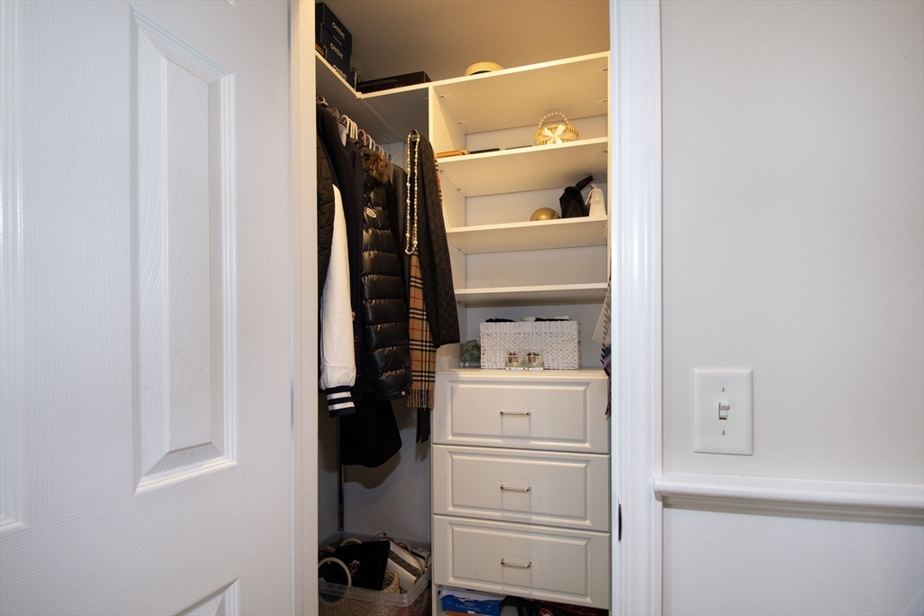 21 Union Street Marshfield, MA 02050 - Photo 15 of 31 a view of walk in closet with clothes and shoes