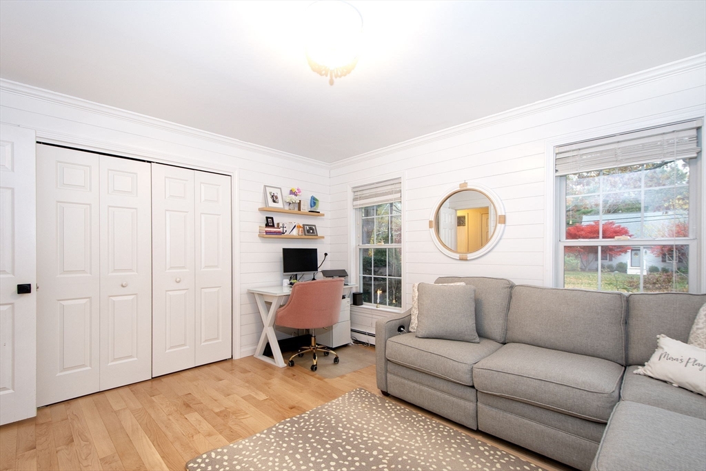 21 Union Street Marshfield, MA 02050 - Photo 17 of 31 a living room with furniture and a window