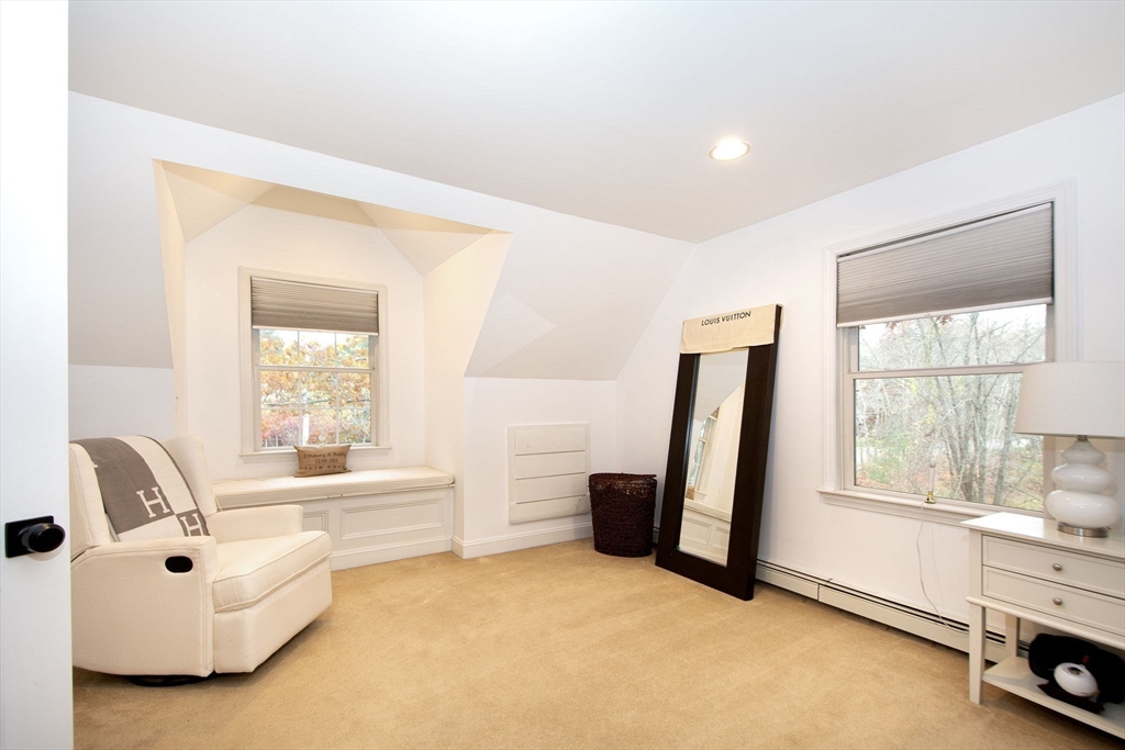 21 Union Street Marshfield, MA 02050 - Photo 19 of 31 a living room with furniture and a window