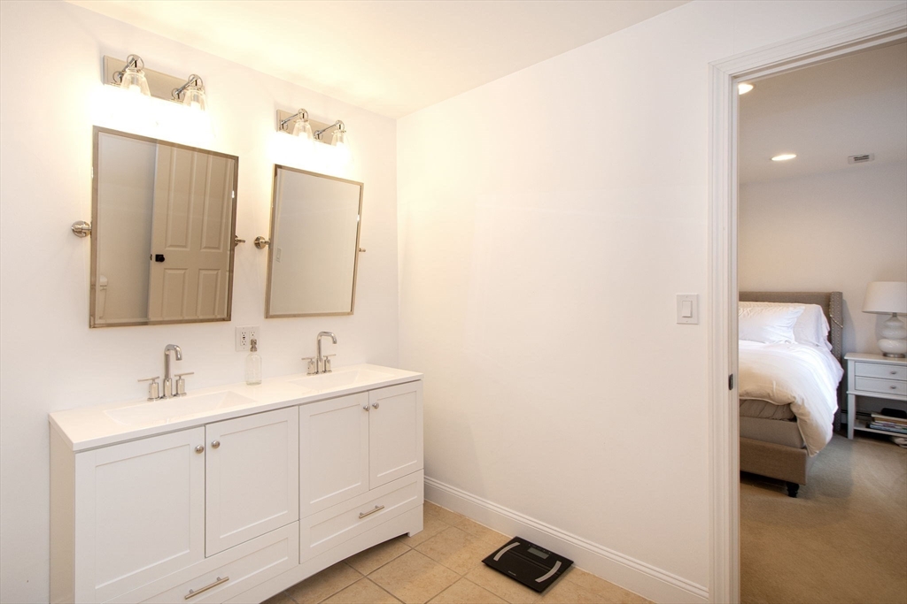 21 Union Street Marshfield, MA 02050 - Photo 22 of 31 a en suite bathroom with a sink and a mirror