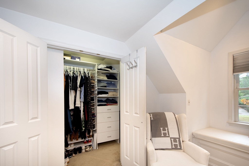 21 Union Street Marshfield, MA 02050 - Photo 23 of 31 a view of walk in closet with clothes and shoes