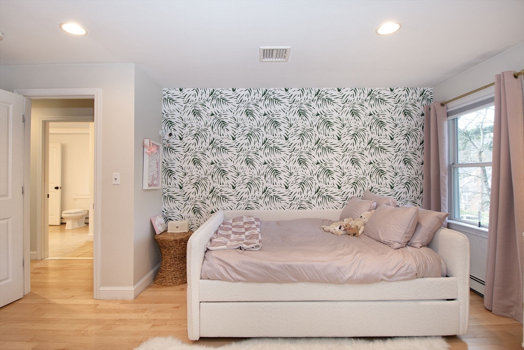 21 Union Street Marshfield, MA 02050 - Photo 27 of 31 a bedroom with a bed and a window