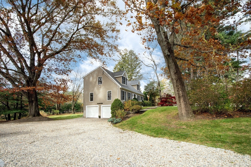 21 Union Street Marshfield, MA 02050 - Photo 31 of 31 a view of a house with a yard and large trees