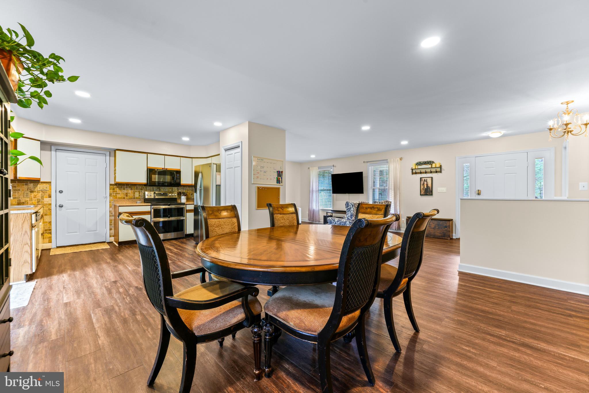 2847 Moores Road Baldwin, MD 21013 - Photo 20 of 73 a view of a dining room with furniture and wooden floor