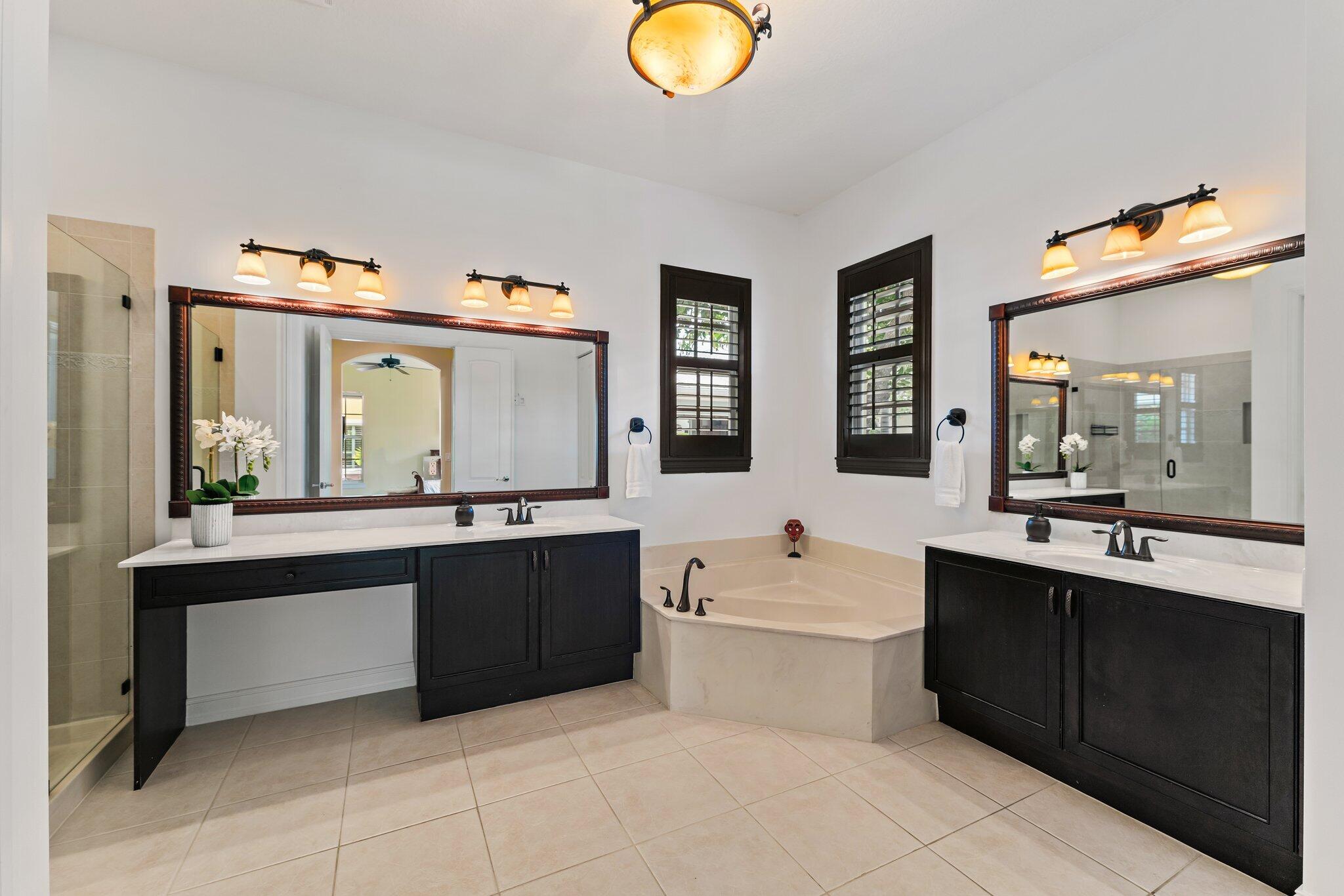 111 Leather Leaf Drive Jupiter, FL 33458 - Photo 35 of 81 1st Floor Primary Bath Ensuite