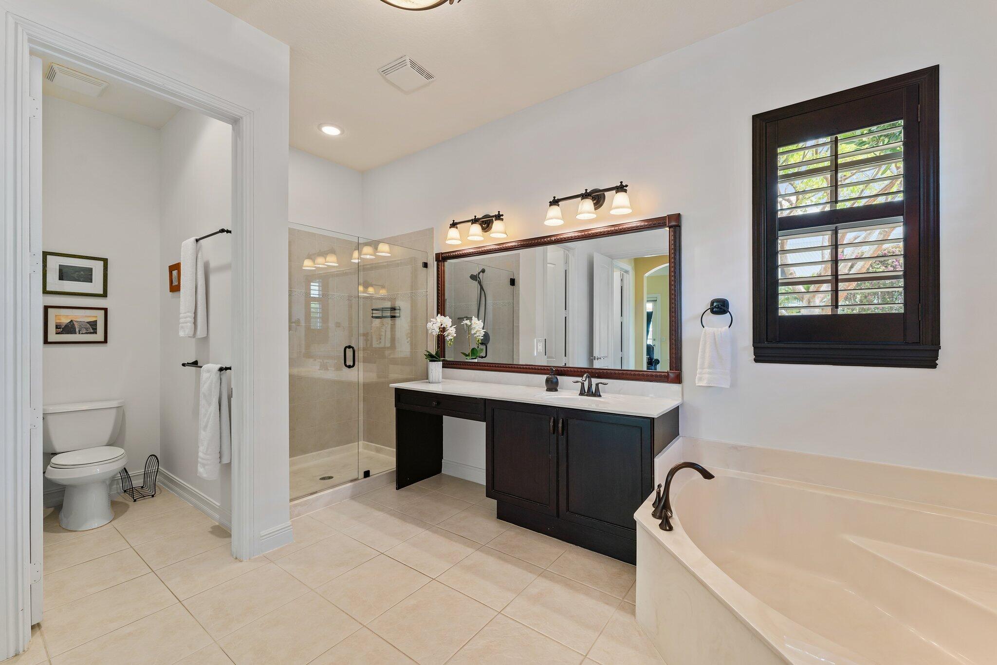 111 Leather Leaf Drive Jupiter, FL 33458 - Photo 37 of 81 1st Floor Primary Bath Ensuite
