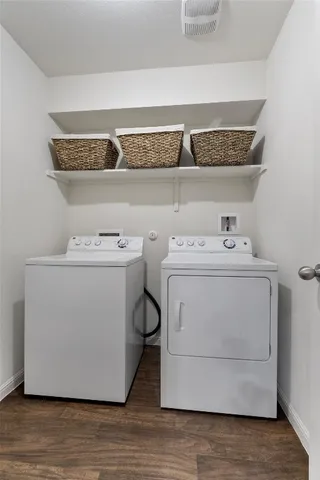 a utility room with a washer and dryer