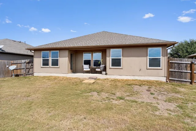 a house view with a outdoor space