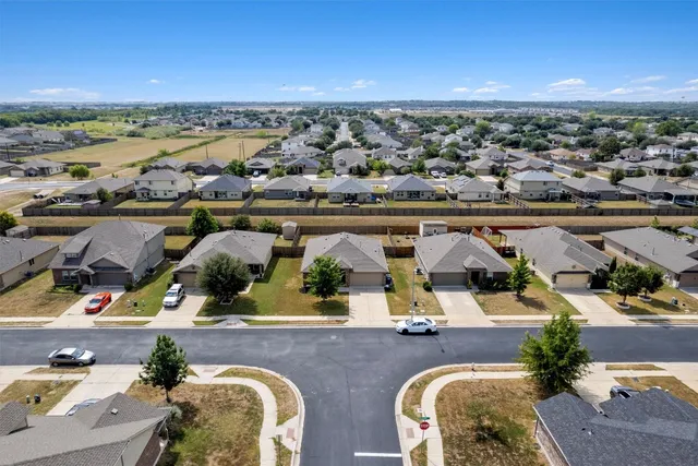 an aerial view of house with outdoor space
